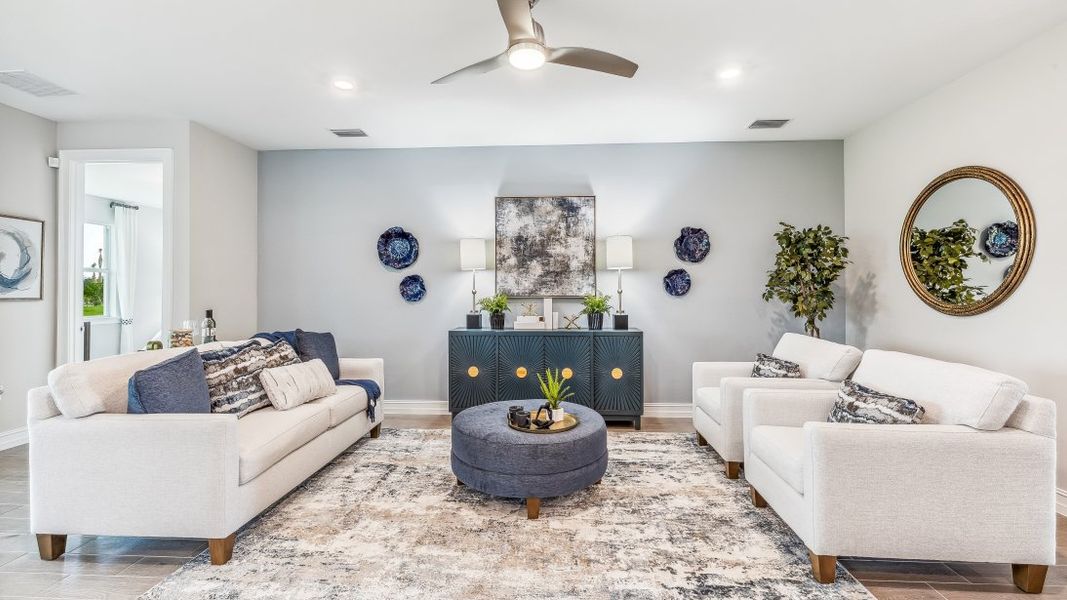 Representative furnished interior of a home built from the DELRAY by D.R. Horton in Palmetto Landing at Babcock Ranch, Punta Gorda (Image 7).