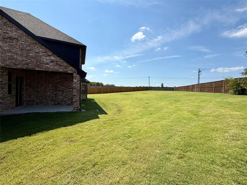 Exterior details and patio area of a home in Mercer Meadows, Royse City (Image 2). Exterior details and patio area of a home in Mercer Meadows, Royse City (Image 2).