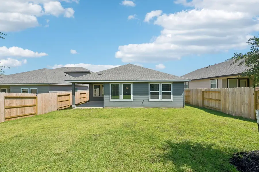 Exterior details and patio area of a home in Pine Lake Cove - Premier Series, Montgomery (Image 2).
