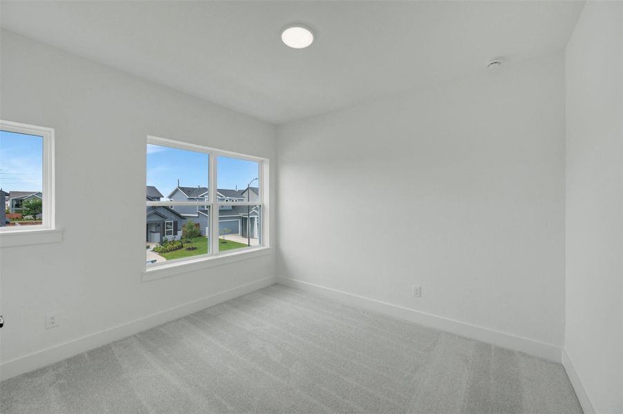 Spacious, unfurnished interior of a new home in Elyson - Grove Row Collection, Katy (Image 29).