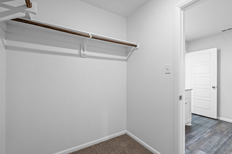 Representative furnished interior of a home built from the BELLVUE by D.R. Horton in Faculty Row, Abilene (Image 27).