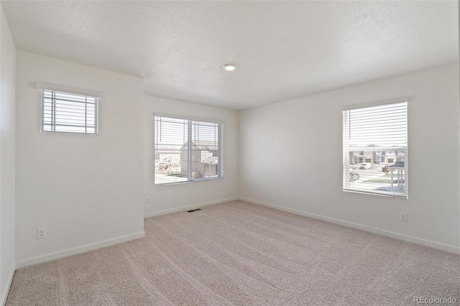 Spacious, unfurnished interior of a new home in Trails at Crowfoot, Parker (Image 18).