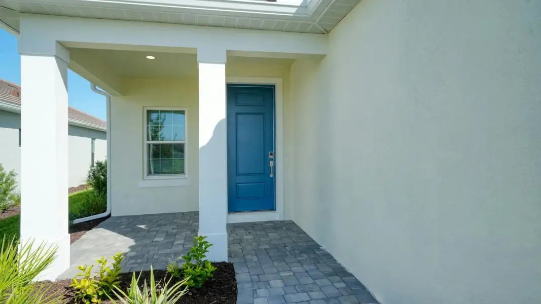 Exterior details and patio area of a home in Windward Real Estate and Homes for Sale in Sarasota, FL - Neal Communities, Sarasota (Image 3). Exterior details and patio area of a home in Windward Real Estate and Homes for Sale in Sarasota, FL - Neal Communities, Sarasota (Image 3).