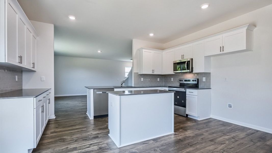 Representative furnished interior of a home built from the Wilmington by D.R. Horton in Baker Farm, Youngsville (Image 4).