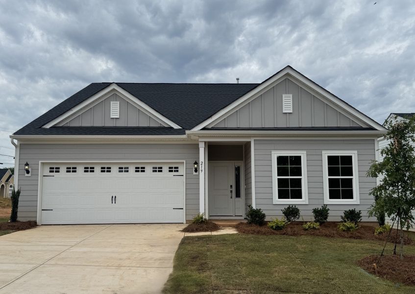 Front exterior of a new home in Willowbrook, Shelby, NC, highlighting curb appeal (Image 1). Front exterior of a new home in Willowbrook, Shelby, NC, highlighting curb appeal (Image 1).