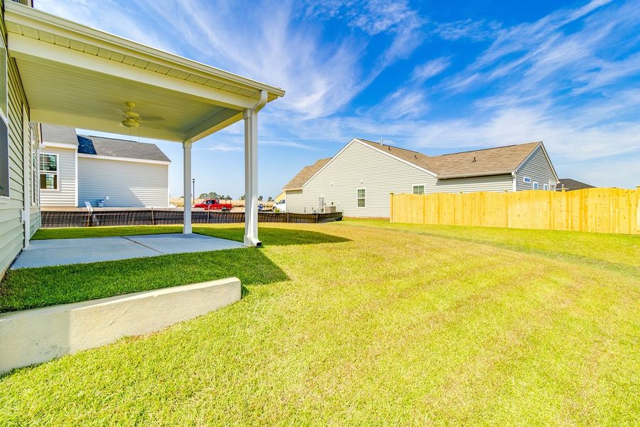 Front exterior of a new home in Winston Point, Gilbert, SC, highlighting curb appeal (Image 19). Front exterior of a new home in Winston Point, Gilbert, SC, highlighting curb appeal (Image 19).