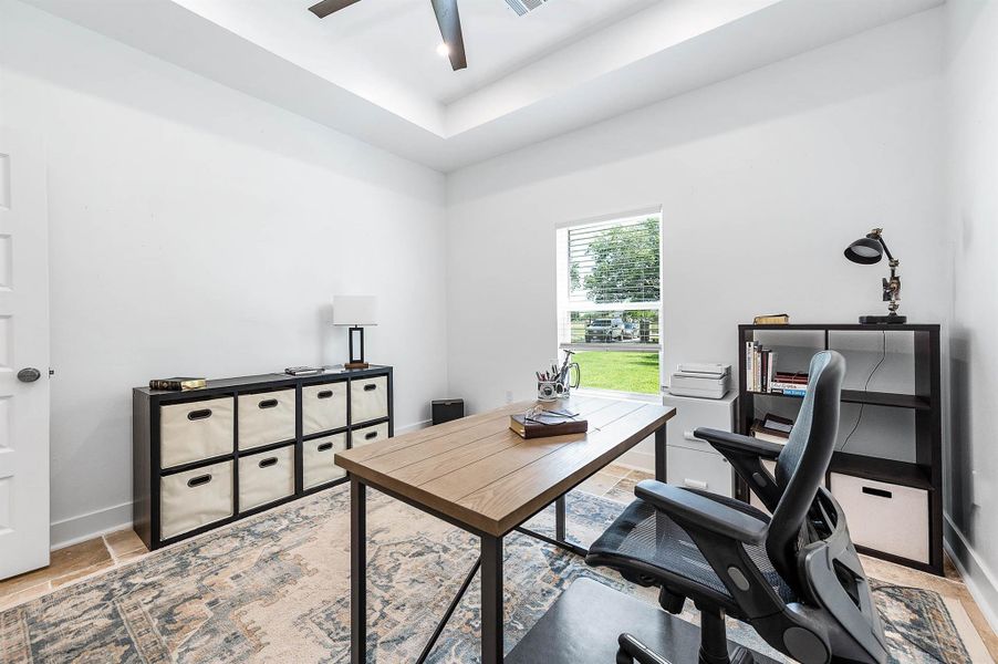 Another view of the third bedroom highlights the room’s spacious layout, natural lighting, and flexible functionality. Whether used for work, guests, or everyday living, this space offers comfort and versatility with a clean, modern feel.