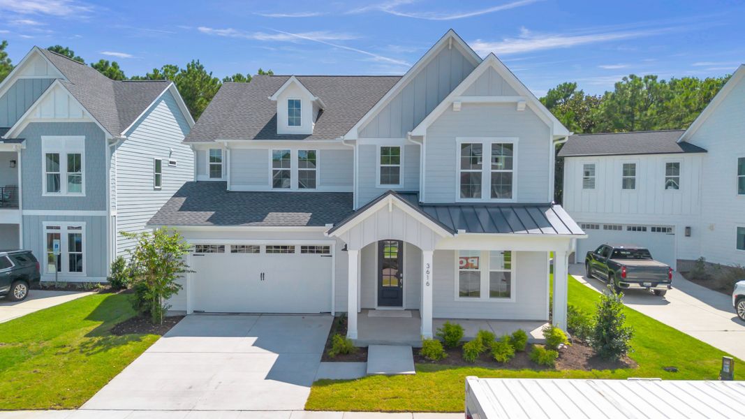Representative exterior photo of a completed home built from the The Hampton by RobuckHomes in Stonehenge, Raleigh, NC (Image 35).