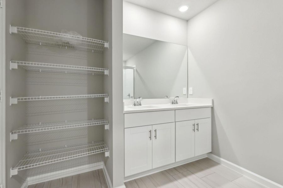 Furnished interior view inside a new home in Hampton Park - Classic Series, Vero Beach (Image 7). Furnished interior view inside a new home in Hampton Park - Classic Series, Vero Beach (Image 7).