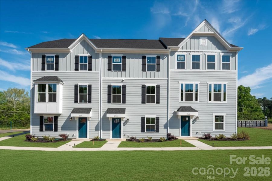 Front exterior of a new home in Stowe Branch Townhomes, Charlotte, NC, highlighting curb appeal (Image 2). Front exterior of a new home in Stowe Branch Townhomes, Charlotte, NC, highlighting curb appeal (Image 2).