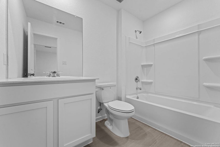 Furnished interior view inside a new home in Torian Village: Belmar Collection, San Antonio (Image 4).