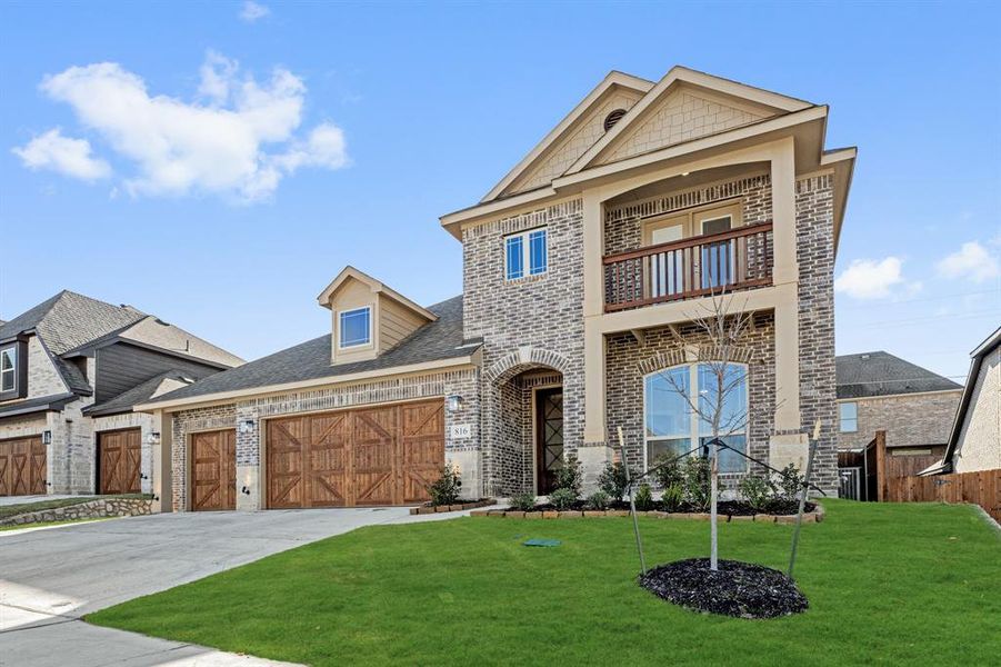 Front exterior of a new home in Homestead at Daniel Farms, DeSoto, TX, highlighting curb appeal (Image 26).