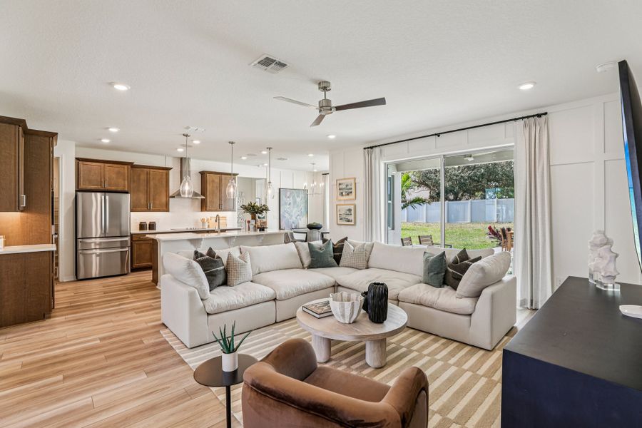 Representative furnished interior of a home built from the Briella by Risewell Homes in Country Club Estates, Palm Bay (Image 5).