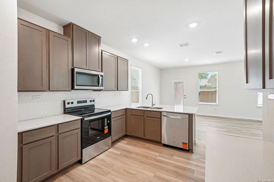 Furnished interior view inside a new home in Nagel Crossing, San Antonio (Image 5).