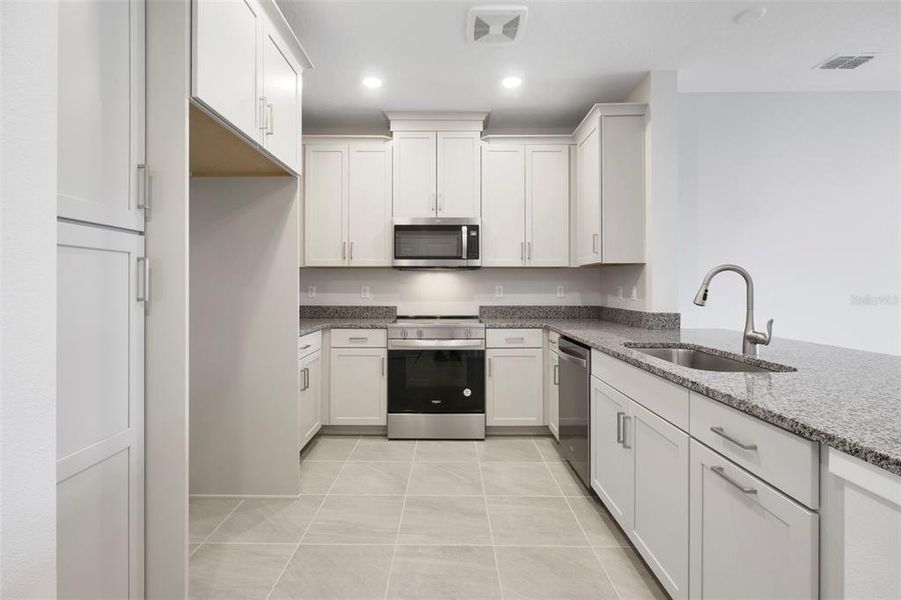 Furnished interior view inside a new home in Gatherings® of Lake Nona, Orlando (Image 7).