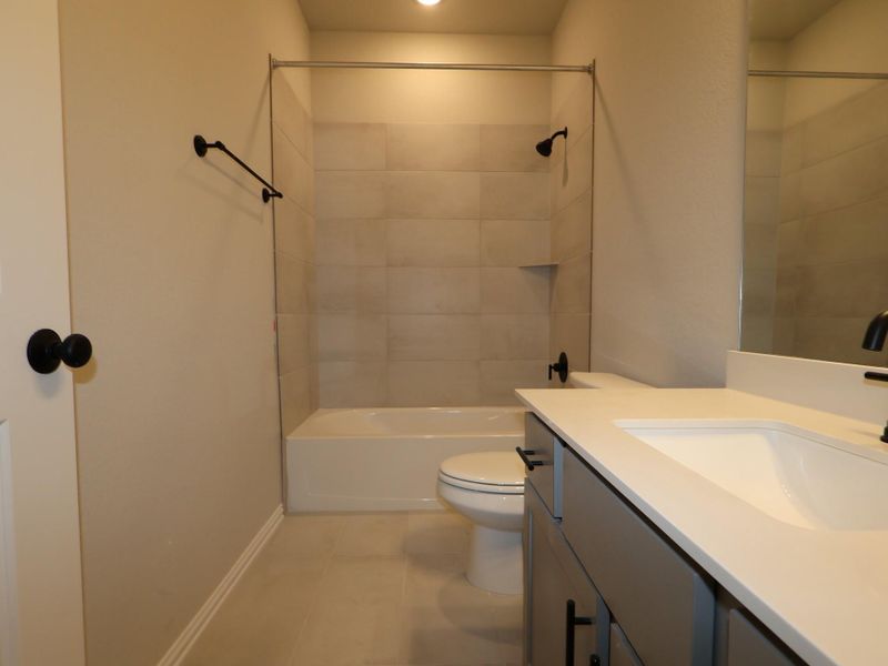 Furnished interior view inside a new home in Heritage, Dripping Springs (Image 8).