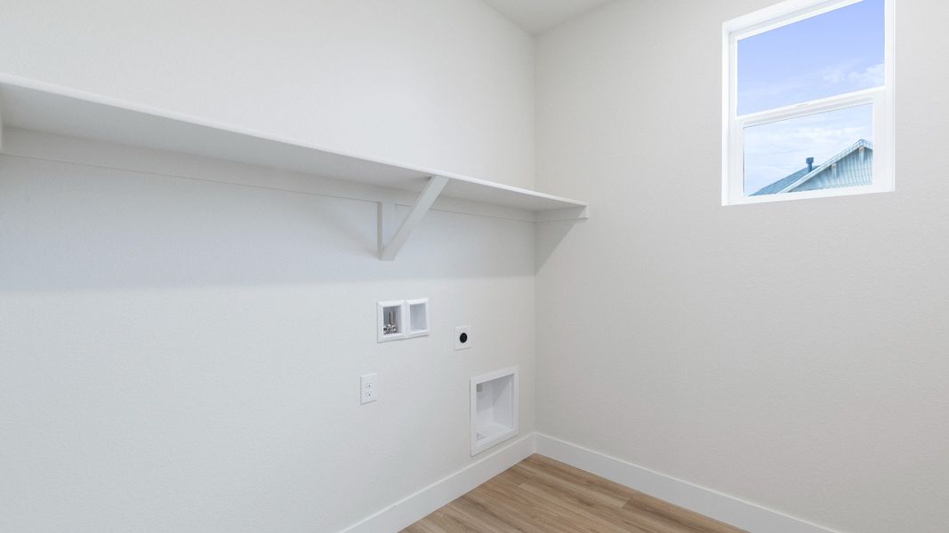 Furnished interior view inside a new home in Dillon Pointe - Journey, Broomfield (Image 28).