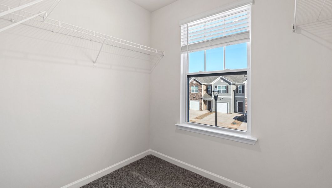 Spacious, unfurnished interior of a new home in Tanglewood Townes, Greenville (Image 21).