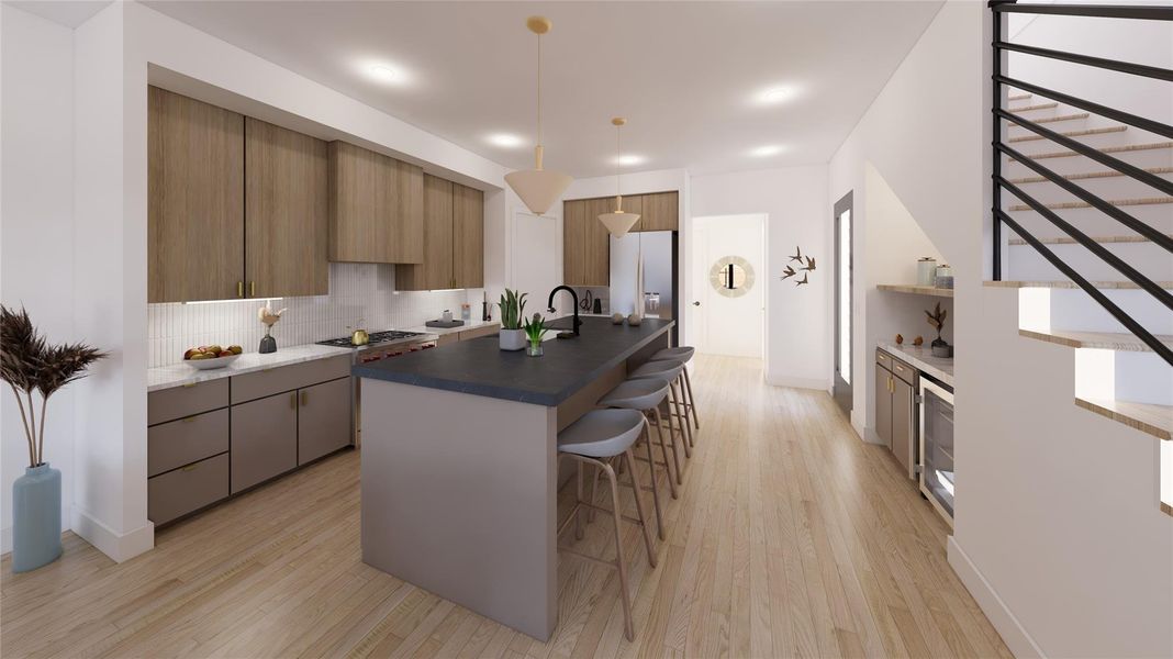 The kitchen is a chef’s delight featuring premium stainless steel appliance package, including a Wolf 6-burner gas range and oven.
