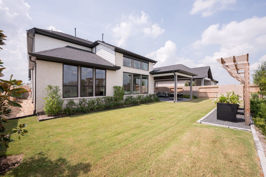 Representative exterior details of a home built from the Barnhart by Tri Pointe Homes in Dunham Pointe, Cypress (Image 24).