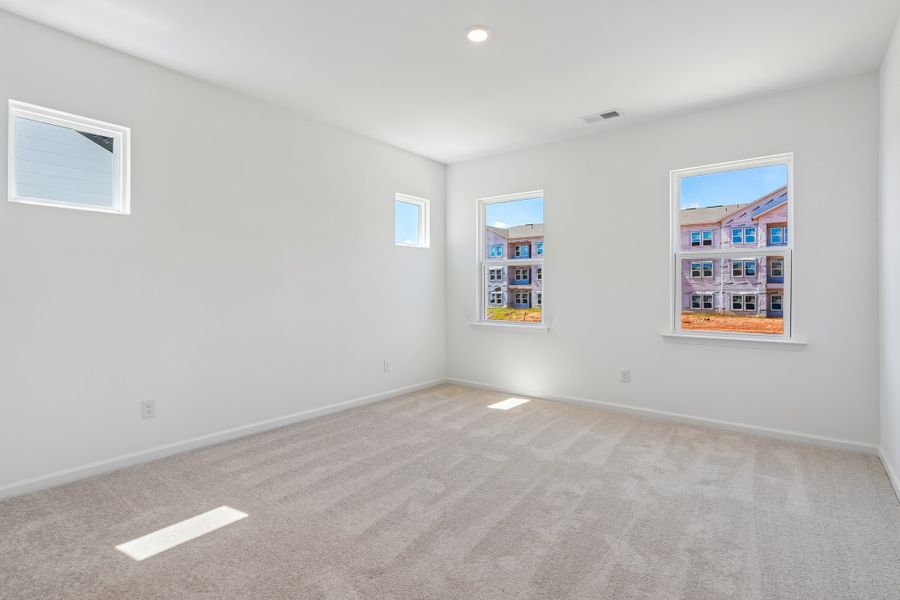 Spacious, unfurnished interior of a new home in Terraces at the Exchange, Indian Land (Image 22).