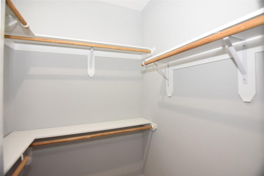 Primary bedroom - small closet Primary bedroom - small closet