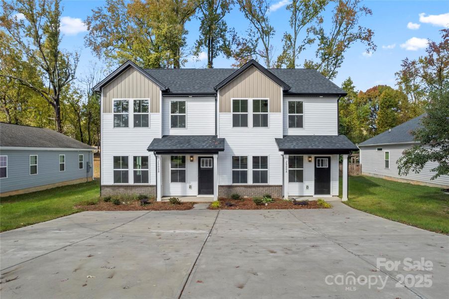 Front exterior of a new home in , Charlotte, NC, highlighting curb appeal (Image 2).