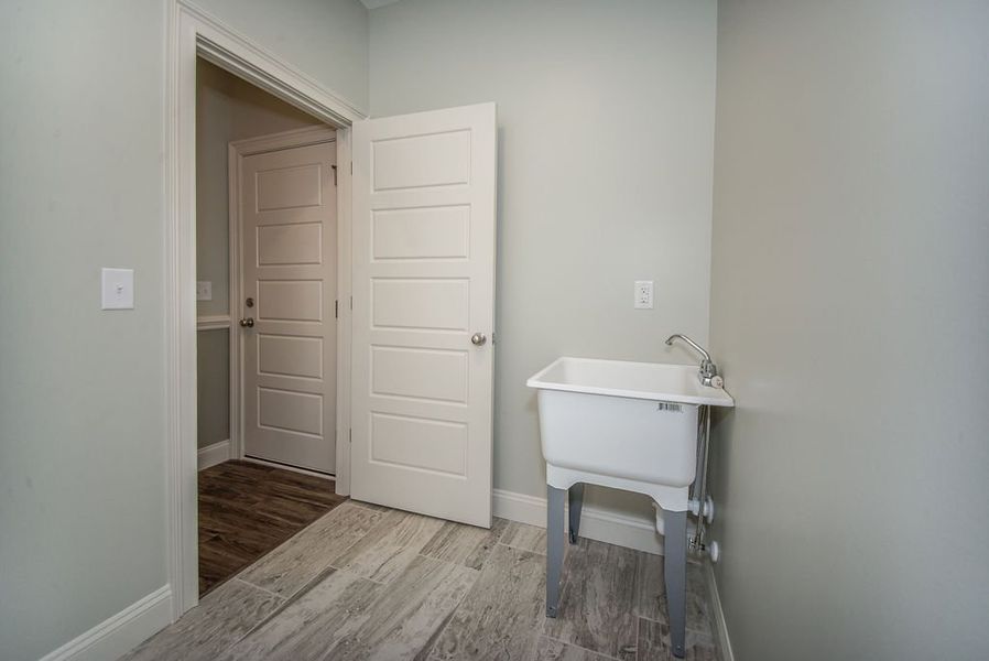 Representative furnished interior of a home built from the Mediterranean by Enchanted Homes in Messer Farms, Inman (Image 15).