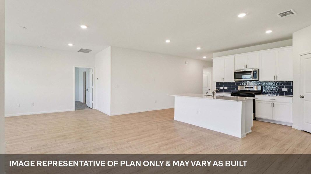 Representative furnished interior of a home built from the The Irvine by D.R. Horton in Carillon, Manor (Image 3).