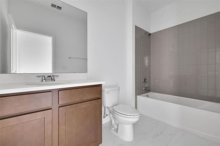 Furnished interior view inside a new home in Serenade at Ovation, Winter Garden (Image 10). Furnished interior view inside a new home in Serenade at Ovation, Winter Garden (Image 10).