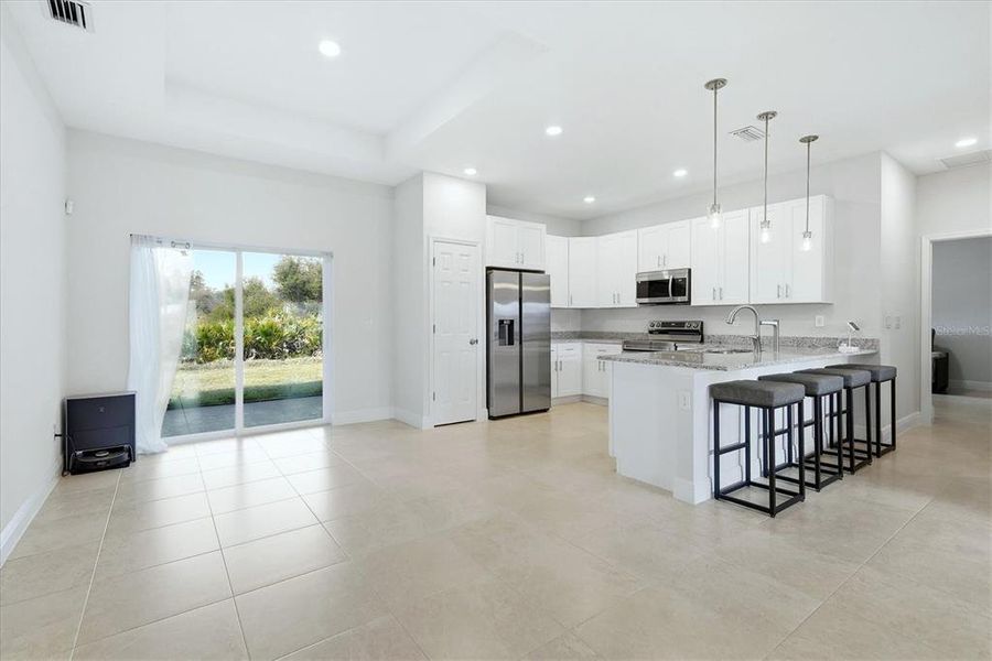 Furnished interior view inside a new home in , North Port (Image 13).
