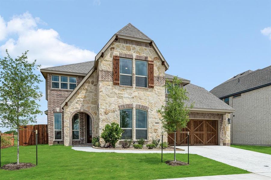 Front exterior of a new home in The Oaks, Red Oak, TX, highlighting curb appeal (Image 2). Front exterior of a new home in The Oaks, Red Oak, TX, highlighting curb appeal (Image 2).