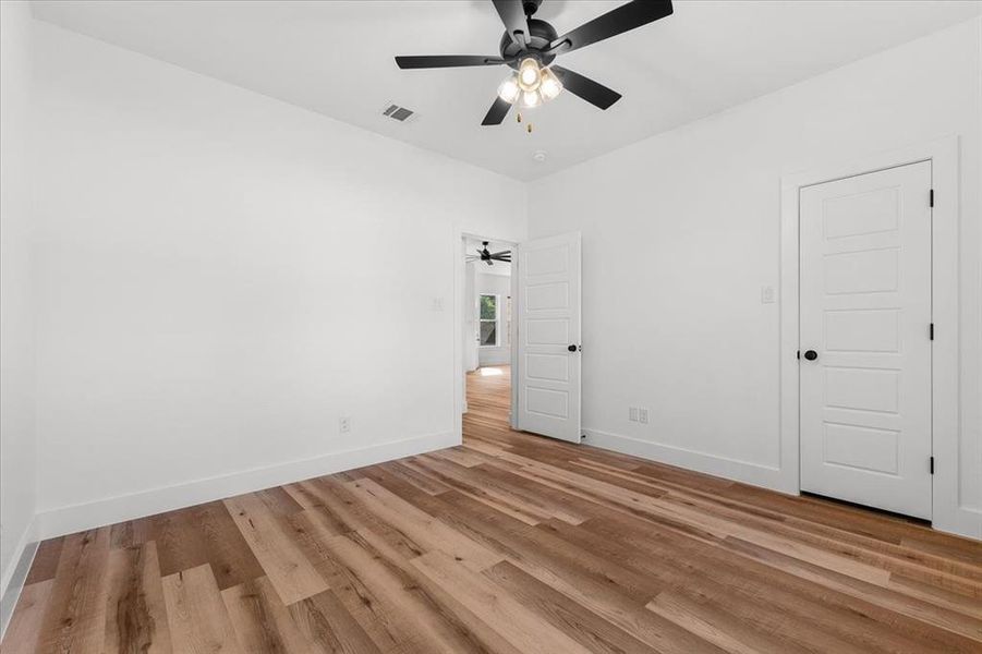 Spare room with light hardwood / wood-style floors