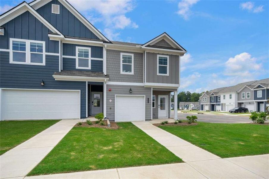 Front exterior of a new home in Walden Park – The Collection, Jonesboro, GA, highlighting curb appeal (Image 2). Front exterior of a new home in Walden Park – The Collection, Jonesboro, GA, highlighting curb appeal (Image 2).