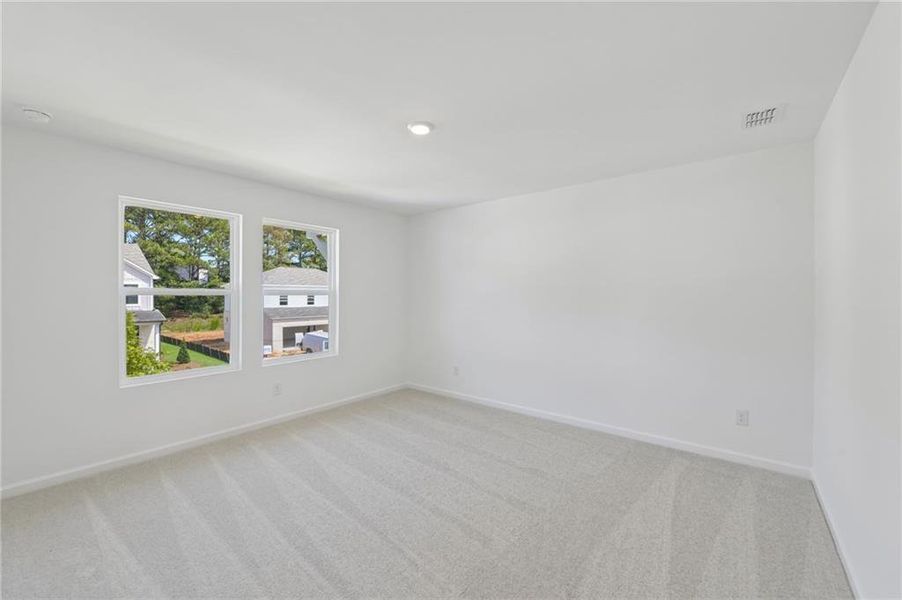 Spacious, unfurnished interior of a new home in Windance Lake, Loganville (Image 40).