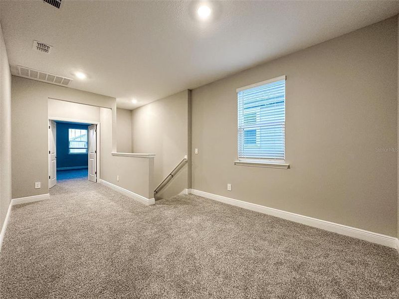 Spacious, unfurnished interior of a new home in Silverleaf Reserve Bungalows, Winter Garden (Image 19).