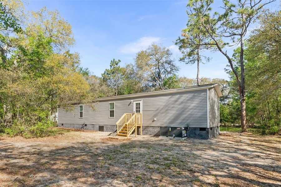 Exterior details and patio area of a home in , Bronson (Image 20).