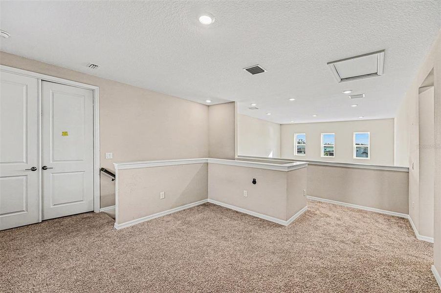 Spacious, unfurnished interior of a new home in Eave's Bend at Artisan Lakes, Palmetto (Image 16).