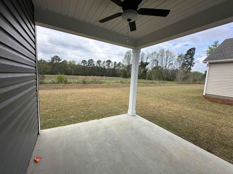 Exterior details and patio area of a home in Oak Hollow, Longs (Image 3).