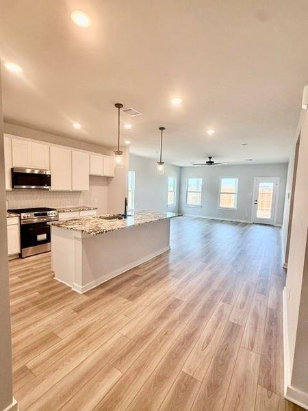 Furnished interior view inside a new home in Sundance Cove, Crosby (Image 4).