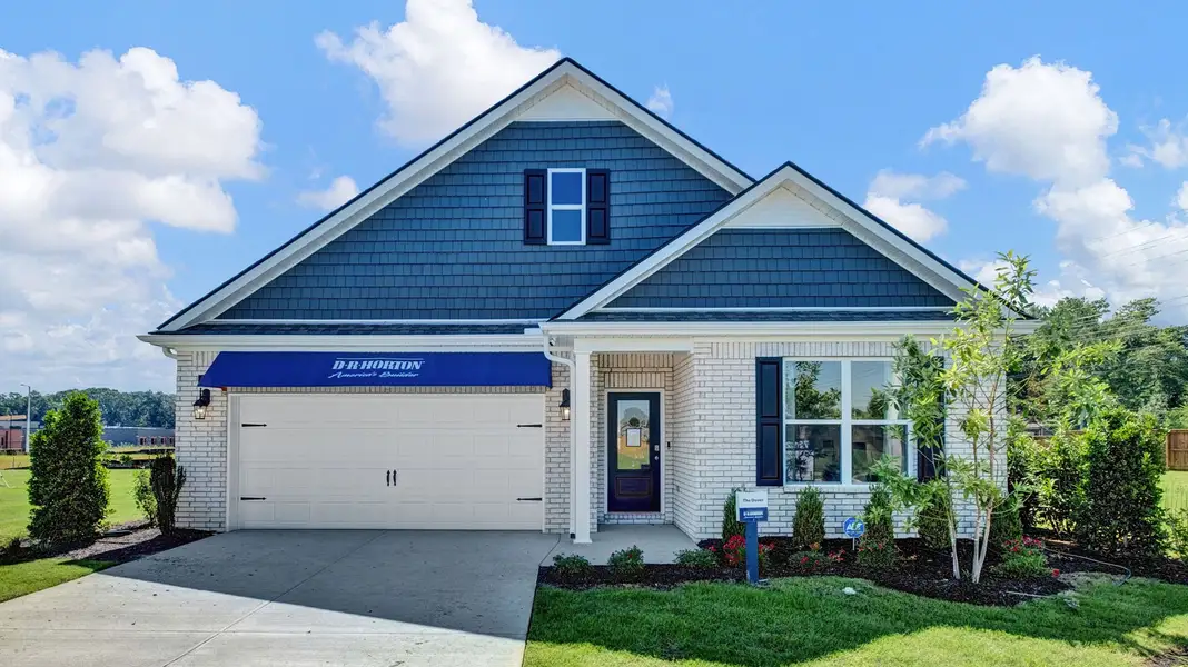 Front exterior of a new home in Shiloh Springs, Jackson, TN, highlighting curb appeal (Image 2).