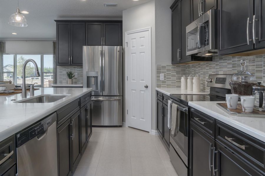 Representative furnished interior of a home built from the Wilshire by Risewell Homes in Harrell Oaks, Orlando (Image 8).