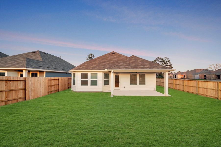 Exterior details and patio area of a home in Moran Ranch, Willis (Image 21).