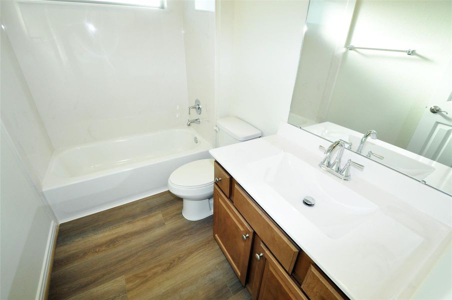 Furnished interior view inside a new home in , League City (Image 11).