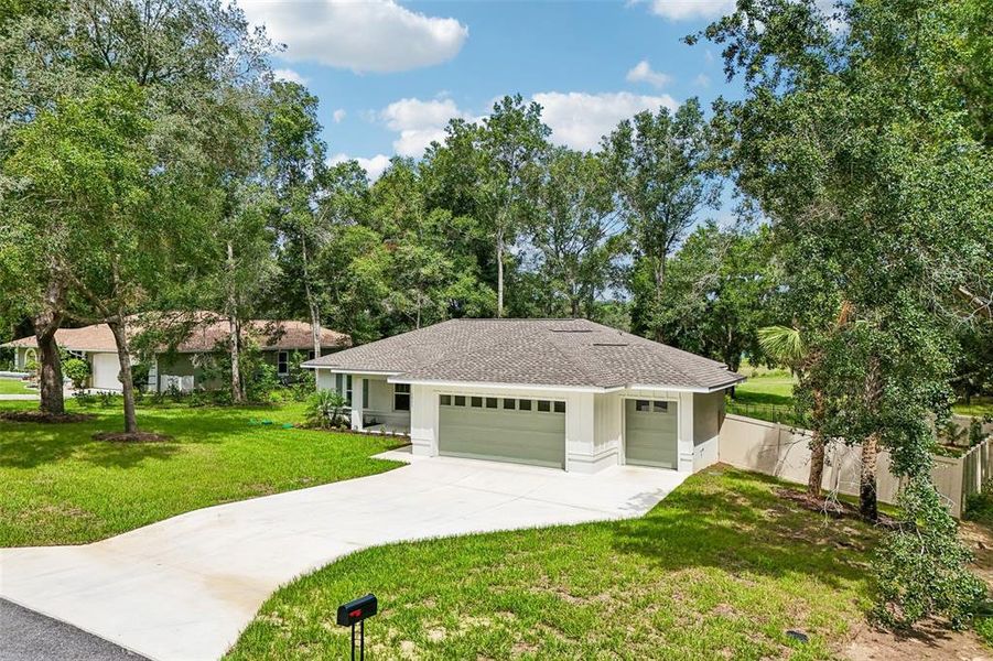 Front exterior of a new home in , Citrus Springs, FL, highlighting curb appeal (Image 26).