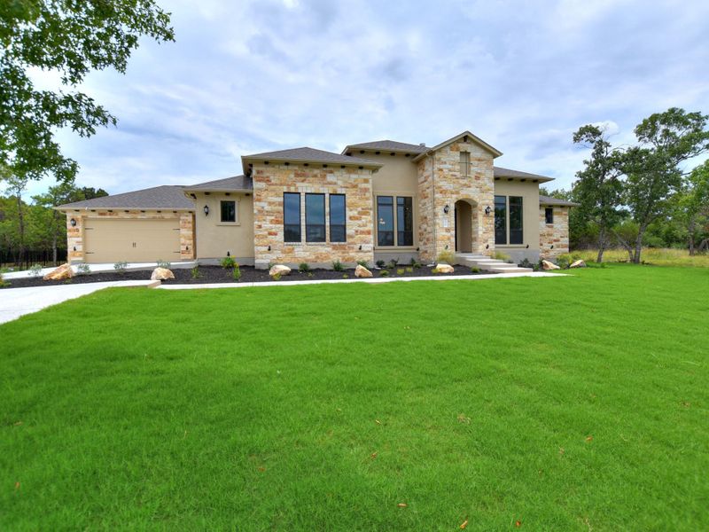 Representative exterior photo of a completed home built from the Avalon by Giddens Homes in Scofield Farms Estates, Georgetown, TX (Image 33).