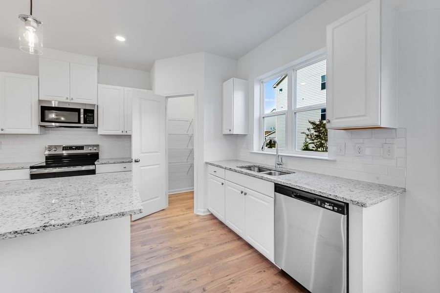 Furnished interior view inside a new home in Chandler Run, Tucker (Image 3).