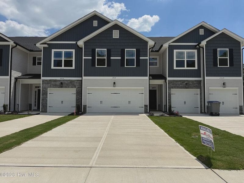 Front exterior of a new home in Joyner Park, Rocky Mount, NC, highlighting curb appeal (Image 2). Front exterior of a new home in Joyner Park, Rocky Mount, NC, highlighting curb appeal (Image 2).