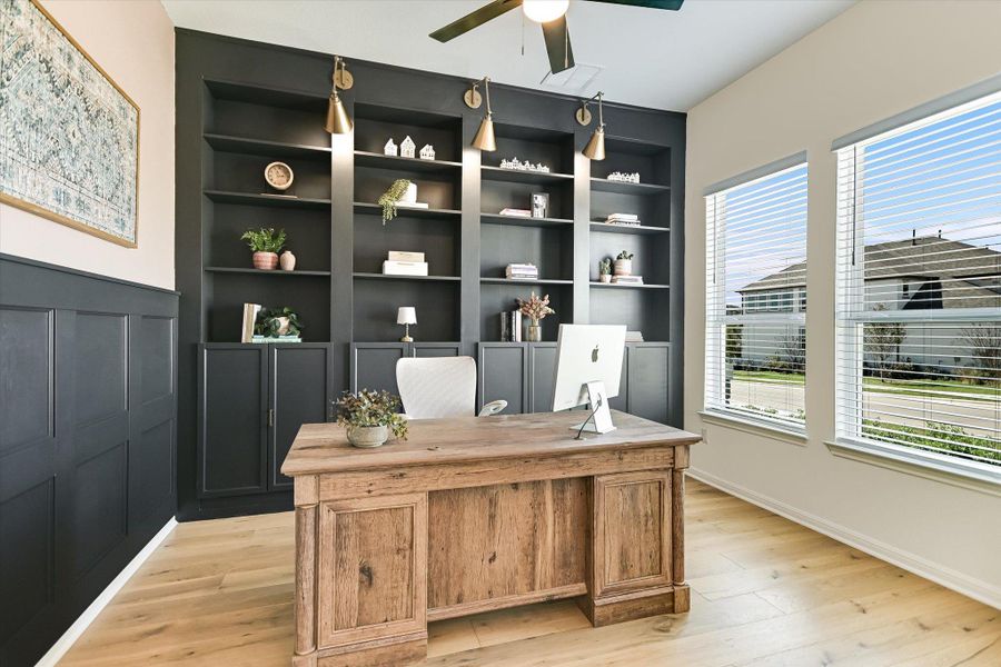 Working from home just became much more productive in this comfortable space with large windows overlooking the front yard and built-ins that are functional as well as attractive.