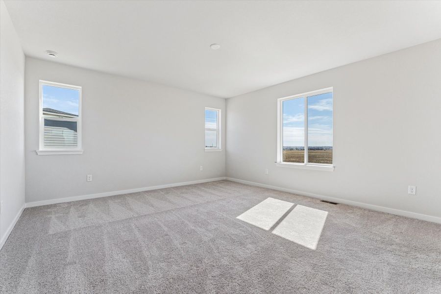 A room with a few windows.